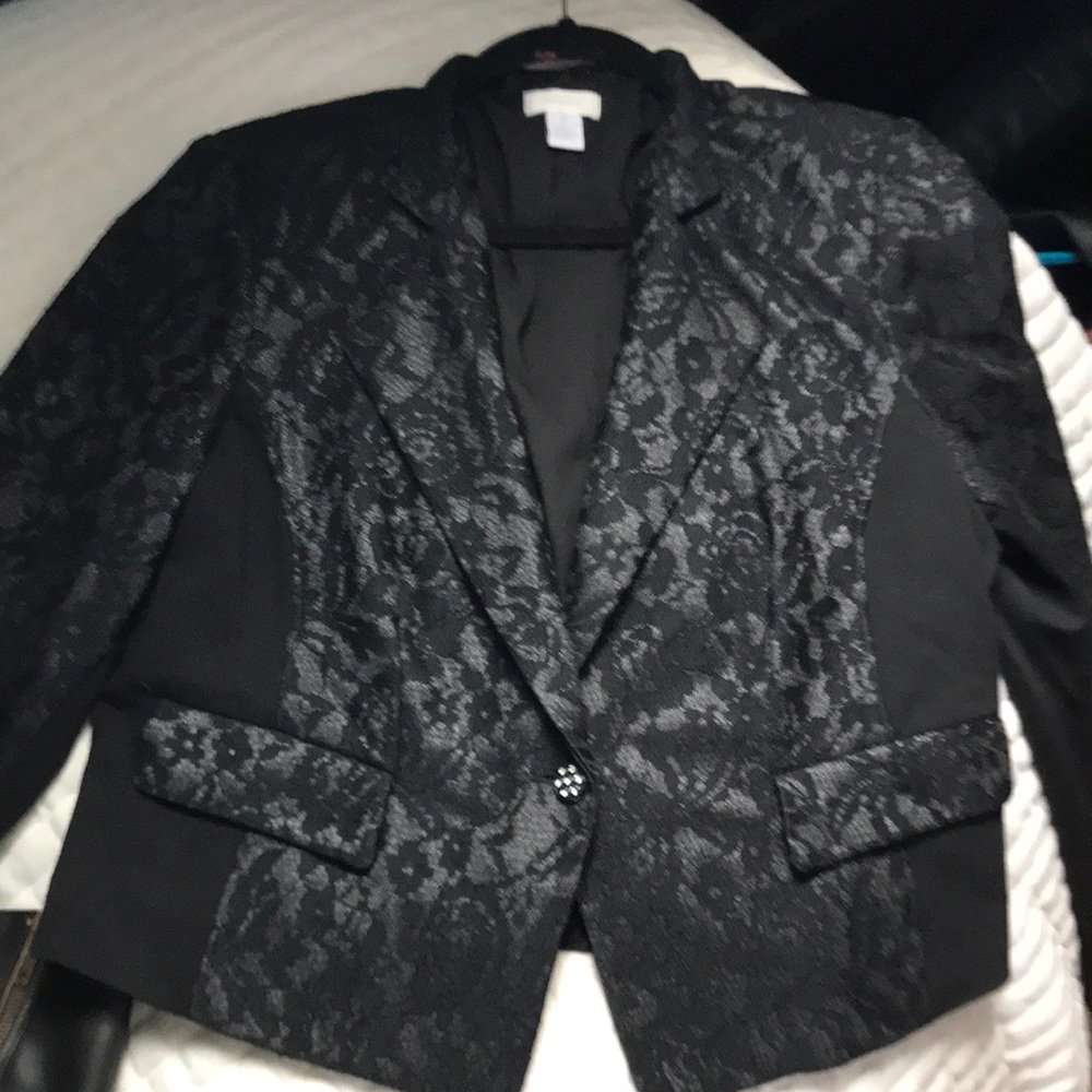Black lace jacket from Chico’s never worn, New condition. Size 2 or 8 to 10